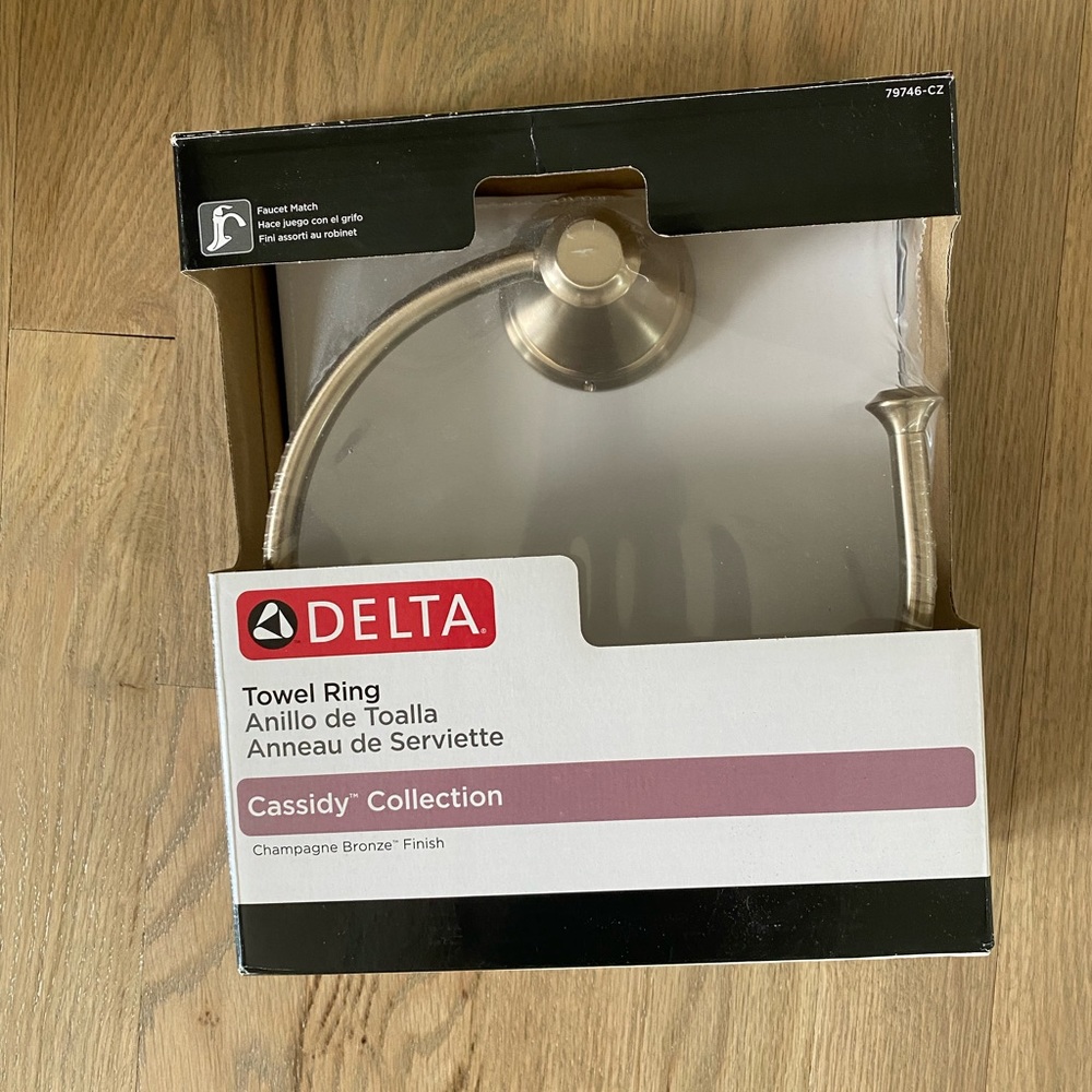 New in box- Delta Cassidy towel ring